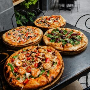 Enjoy diverse gourmet pizzas at a stylish pizzeria in Ciudad de México, ideal for food lovers.